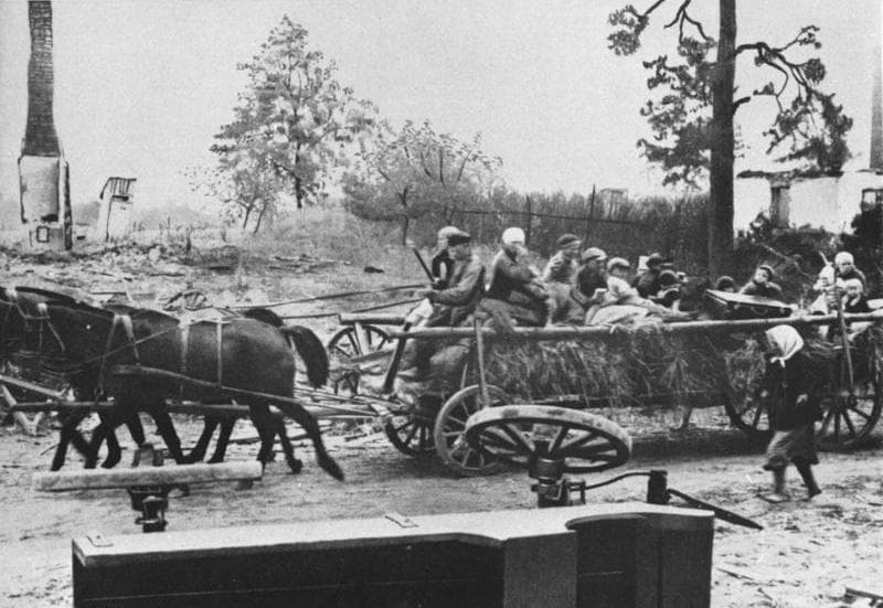 Civilians evacuated on horse-drawn wagons in eastern Germany, 1945.